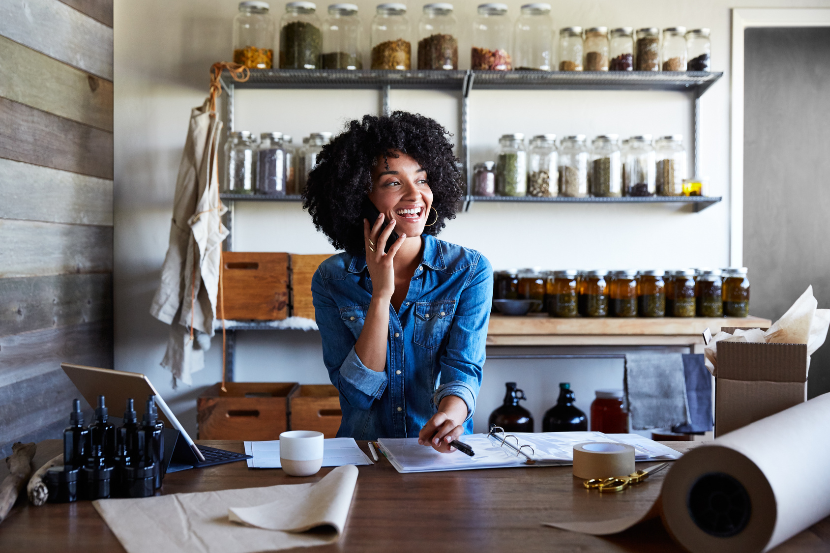 Millennial African American Woman businesswoman on the phone in
